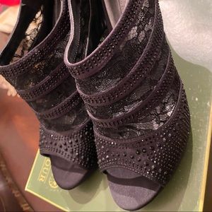 Coach and four black satin booties, size 9.5